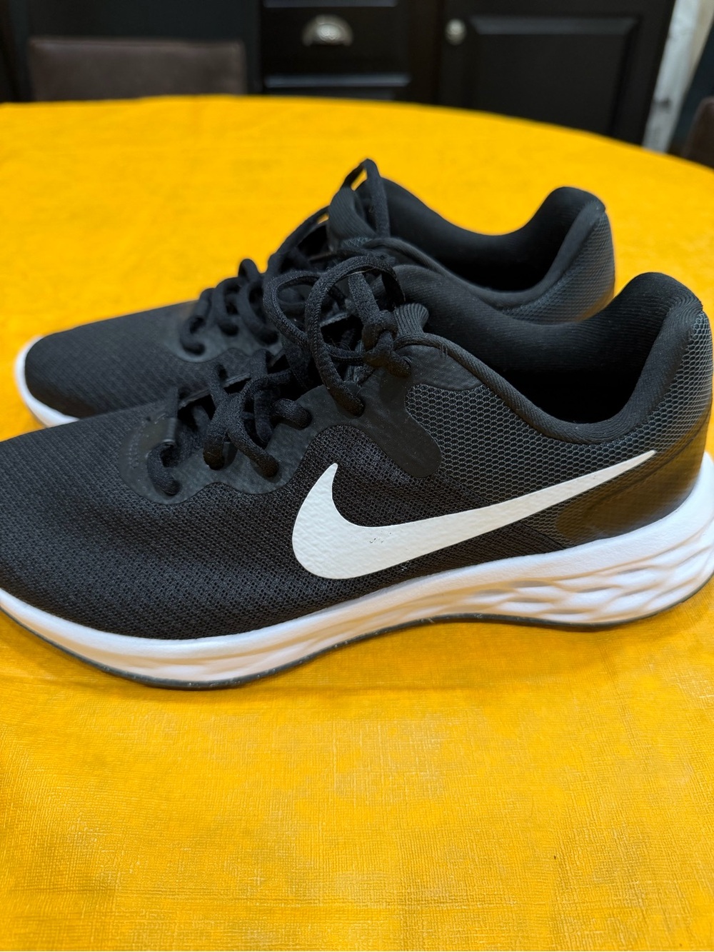 Nike Women’s Black and White Athletic Revolution Running Shoes